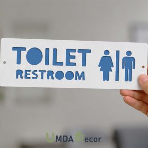 12 × 4 inches reverse-cut toilet / restroom sign: crisp white front panel 2 mm laser-cut to reveal 2 mm blue layer beneath. 4 mm total thickness, ready to mount.