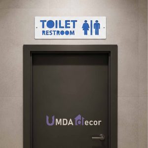 12 × 4 inches reverse-cut toilet / restroom sign: crisp white front panel 2 mm laser-cut to reveal 2 mm blue layer beneath. 4 mm total thickness, ready to mount.